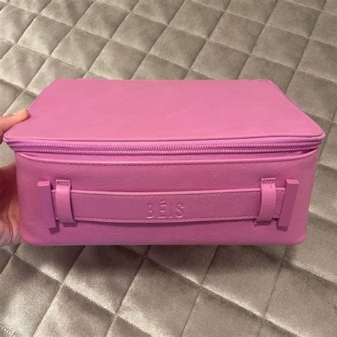 beis berry cosmetic case.